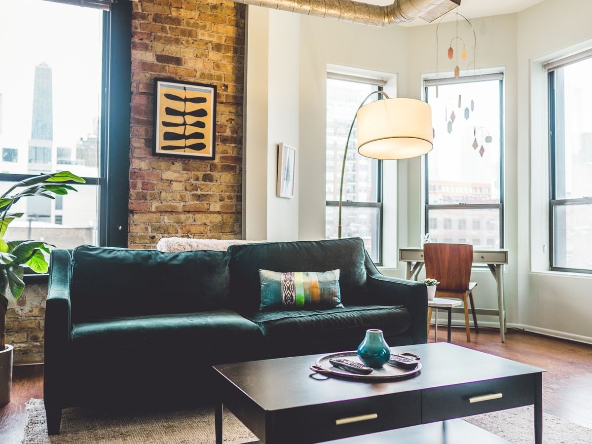 Renovated Manhattan loft living room with city views — Multi Art Renovations
