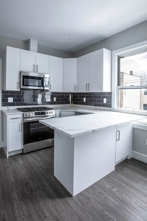 Contemporary Manhattan kitchen renovation by Multi Art Renovations